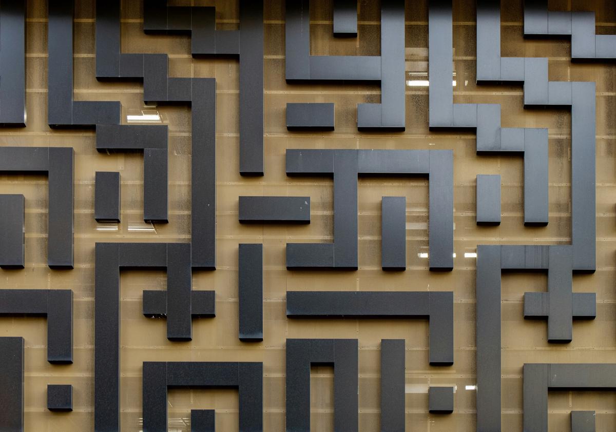 A person navigating a maze, symbolizing the complexity of IRA withdrawal rules and the importance of understanding them to avoid penalties.