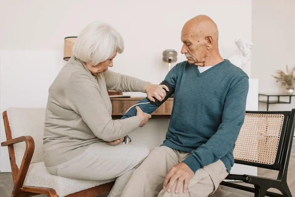 Image of a couple holding hands while looking at a retirement savings account on a computer screen.