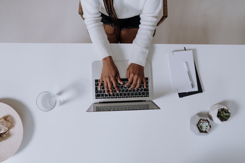 An image of a person looking at a retirement savings plan on a laptop